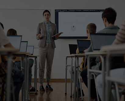 A female professor in a classroom.